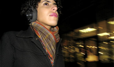 Woman listening to music at night