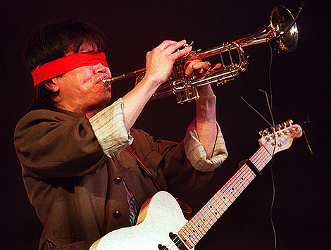 A blindfolded Cui Jian. Photo Getty Images/AFP/Mike Fiala.