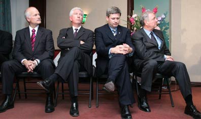 In need of pop culture makeovers? Prime Minister Paul Martin sits next to Conservative Leader Stephen Harper, Bloc Quebecois Leader Gilles Duceppe and NDP Leader Jack Layton at a reception for the Canadian Arab Federation last week in Ottawa. (CP Photo/Jonathan Hayward)