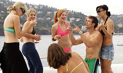 The "Bachelor" confirmed: Travis Stork and a bevy of contestants party on the Riviera. Courtesy Citytv.