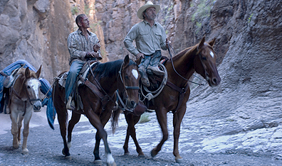 No horsin' around: Perkins and patrolman Mike Norton (Barry Pepper) in The Three Burials of Melquiades Estrada. Photo Dawn Jones. Courtesy Mongrel Media.