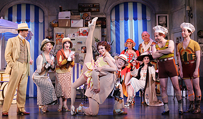 The Broadway cast of The Drowsy Chaperone. From left: Joey Sorge, Linda Griffin, Angela Pupello, Sutton Foster, Patrick Wetzel, Jennifer Smith, Lenny Wolpe, Beth Leavel (seated), Jason Kravits and Garth Kravits. (Joan Marcus/Boneau/Bryan-Brown) 
