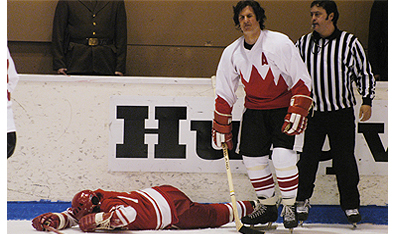 When two tribes go to war: Phil Esposito (David Berni) is penalized yet again.