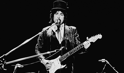 A wearer of many hats: Bob Dylan on stage in 1978. Photo Express Newspapers/Getty Images.