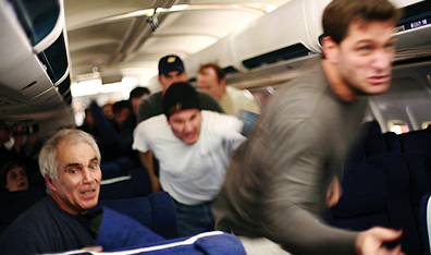 Crew and passengers charge the plane's hijackers in Paul Greengrass's film, United 93. Photo Johnathan Olley/Universal Studios.