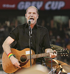 Having a ball: The Hip's Gord Downie performs during the half-time show at the 2004 Grey Cup football final in Ottawa. CP photo/Jonathan Hayward.