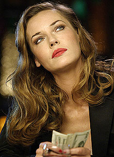 Cool beauty: Strip club owner Renata (Connie Nielsen). Photo Chuck Hodes. Courtesy Alliance Atlantis.