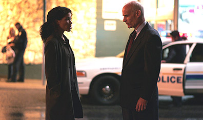 Vancouver Organized Crime Unit head Mary Spalding (Klea Scott) and detective Teddy Atlas (Matt Frewer), in Intelligence. 
