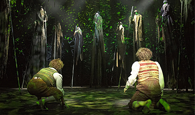 Owen Sharpe (Pippin) and Dylan Roberts (Merry) encounter the Ents of Fangorn in The Lord of the Rings. Photo Manuel Harlan. Courtesy Mirvish Productions.