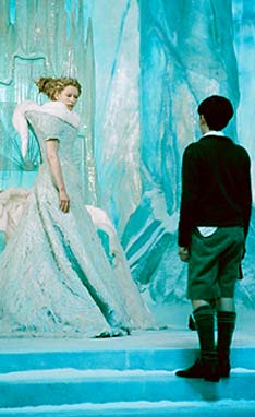 Cold comfort: White Witch (Tilda Swinton), ensnares Edmund Pevensie (Skandar Keynes). Photo Phil Bray. Courtesy Walt Disney Pictures.