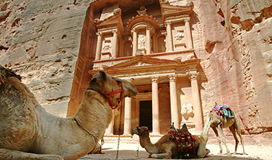 Camels rest in front of Al Khazneh in Jordan's ancient city of Petra. Photo Thomas Coex/AFP/Getty Images.