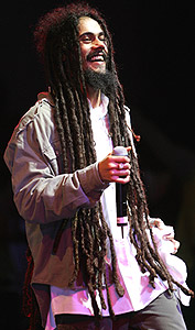 Prodigal son: Damian Marley performs at the Roots, Rock, Reggae Tour
				2004 in New York. Photo Frank Micelotta/Getty Images.