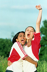 Jess Bharma (Parminder Nagra) and Jules Paxton (Keira Knightley) are mad for soccer in Bend It Like Beckham. Photo Christine Parry. Courtesy 20th Century Fox.