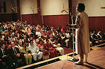 Not a chuckle to be had: Albert Brooks on stage in the film Comedy in
the Muslim World. Courtesy Warner Bros Entertainment.