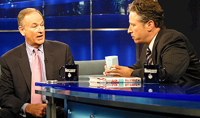 The right-wing guy is sitting on the left: the Fox News Channel's  Bill O'Reilly faces off against The Daily Show's Jon Stewart. Courtesy CTV