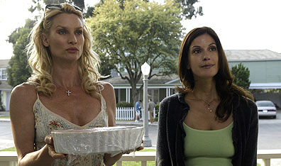 Come and knock on our door: Nicollette Sheridan and Teri Hatcher in Desperate Housewives.Courtesy CTV