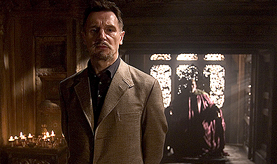 Nothing says "sinister" like a ridiculous 'stache: Henri Ducard (Liam Neeson) as Batman's nefarious mentor. Photo David James. Courtesy Warner Bros.