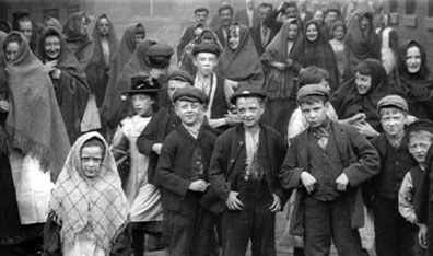 From the Mitchell & Kenyon collection: outside Alfred Butterworth & Sons, Glebe Mills, Hollinwood. c. 1901. Courtesy British Film Institute.