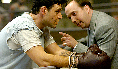 Braddock (Crowe) discussing strategy with manager Joe Gould (Paul Giamatti). Photo George Kraychyk. Courtesy Universal Pictures.
