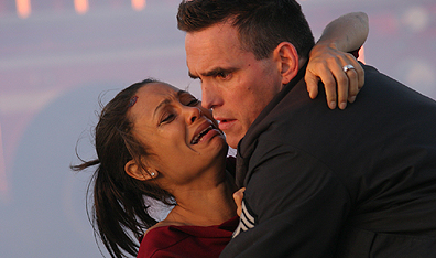A socialite (Thandie Newton) is pulled from a car wreck by an officer (Matt Dillon) in Crash. Photo Lorey Sebastian. Courtesy Lions Gate Entertainment.