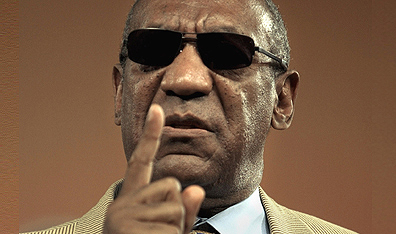 Bill Cosby defending his views on low-income blacks in a speech in Washington, D.C. in 2004, on what author Michael Eric Dyson calls Cosby's "Blame the Poor Tour." AP Photo/M. Spencer Green.