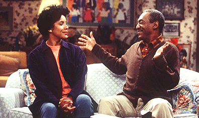 The comic actor with Cosby Show co-star Phylicia Rashad. AP Photo/Tony Esparza.