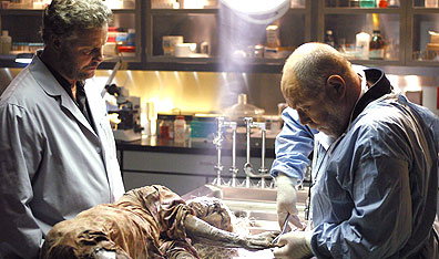 A View To A Kill: Actor William Petersen, left,  shows an appropriate amount of concern in a scene from the CBS hit show, CSI: Crime Scene Investigation. AP Photo.