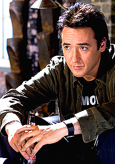 Hangdog look: Cusack in Must Love Dogs. Courtesy Warner Bros.