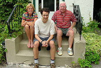 TJ Dawe with his Winnipeg billets, the Johnsons.