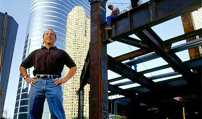 Former Enron CEO Jeff Skilling stands tall outside Enron Headquarters, from Alex Gibney's Enron: The Smartest Guys in the Room. Courtesy Alliance Atlantis.