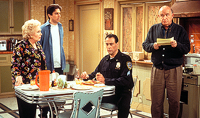 Left to right, Doris Roberts (Marie Barone), Ray Barone (Ray Romano), Robert Barone (Brad Garrett) and Frank Barone (Peter Boyle) on Everybody Loves Raymond. Courtesy Global TV.