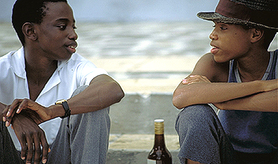 Lansana Kourouma as Fanfan and Uly Darly as Gégé in the film Le goût des jeunes filles (On the Verge of a Fever). Courtesy Christal Films.