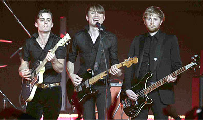 Thin White Dukes: Scottish group Franz Ferdinand rock it retro style. AP Photo by Andrew Medichini