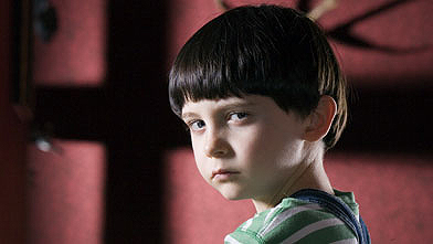 Holy terror: Damien Thorn (Seamus Davey-Fitzpatrick) is the spawn of Satan in a new remake of The Omen. Courtesy Twentieth Century Fox.