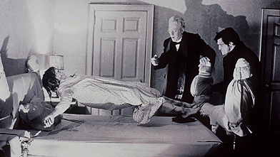 Achieving lift-off: Linda Blair gets the party started with Max Von Sydow  and Jason Miller in The Exorcist. (CP Photo)