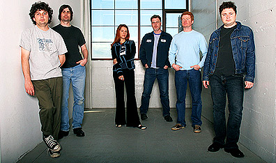 Taking a stand: The New Pornographers. From left: Kurt Dahle, Todd Fancey, Neko Case, John Collins, Carl Newman and Blaine Thurier. Photo Steven Dewall. Courtesy New Pornographers.  