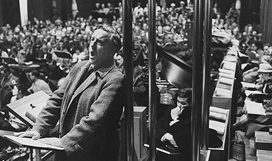 English tenor and organist Peter Pears sings at the rehearsal for the 1962 premiere of Benjamin Britten's "War Requiem" at Coventry Cathedral.  Photo Erich Auerbach/Getty Images.