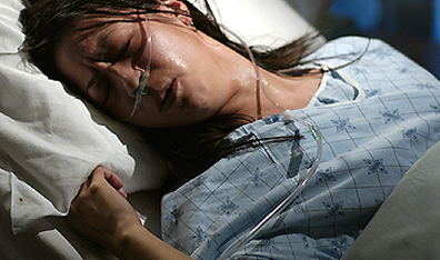 Lannette New as Rosie, a nurse who contracts SARS in Plague City. Courtesy CTV.