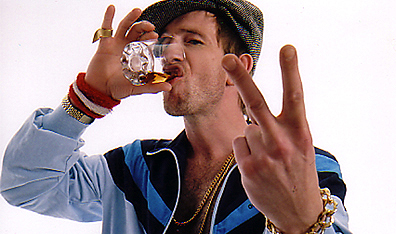 Two-finger salute: Paul Kaye as Frankie Wilde in Michael Dowse's It's All Gone Pete Tong. Courtesy Odeon Films.