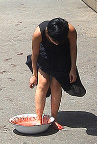 Putting her foot down: from Regina José Galindo's filmed 2003 performance, Quien puede borrar las huellas (Who can remove the traces). Photo Vitto. Courtesy Fondazione La Biennale di Venezia.