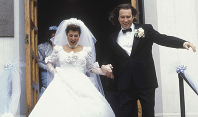 Happy ending: Canadian actress Nia Vardalos and John Corbett leave the church in My Big Fat Greek Wedding. CP Photo
