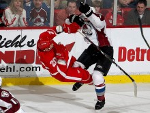 two hockey players collide